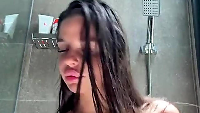 Sonya Jess Enjoys Her Glass Dildo In The Shower