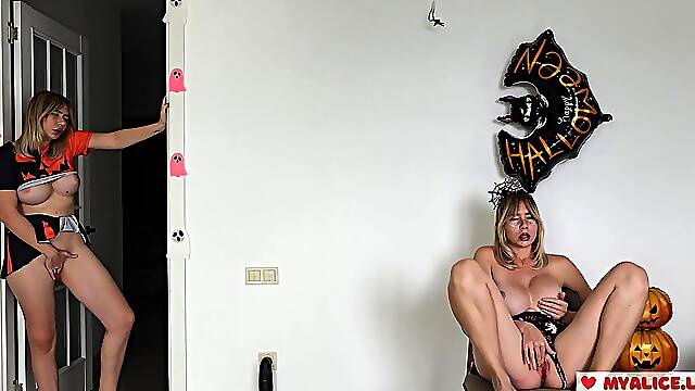 Amateur MILF stepsister seduced by hot lesbians in Halloween costumes