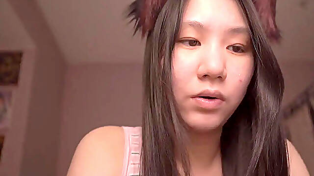 Cute Asian girl reads book in ASMR cosplay roleplay
