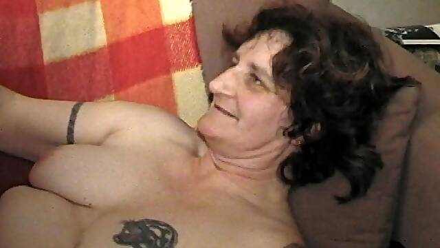 Granny with a big nose lets the guy screw her right there on the bed