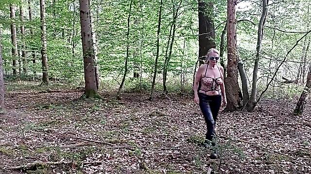 Granny Is Masturbating in the Woods!